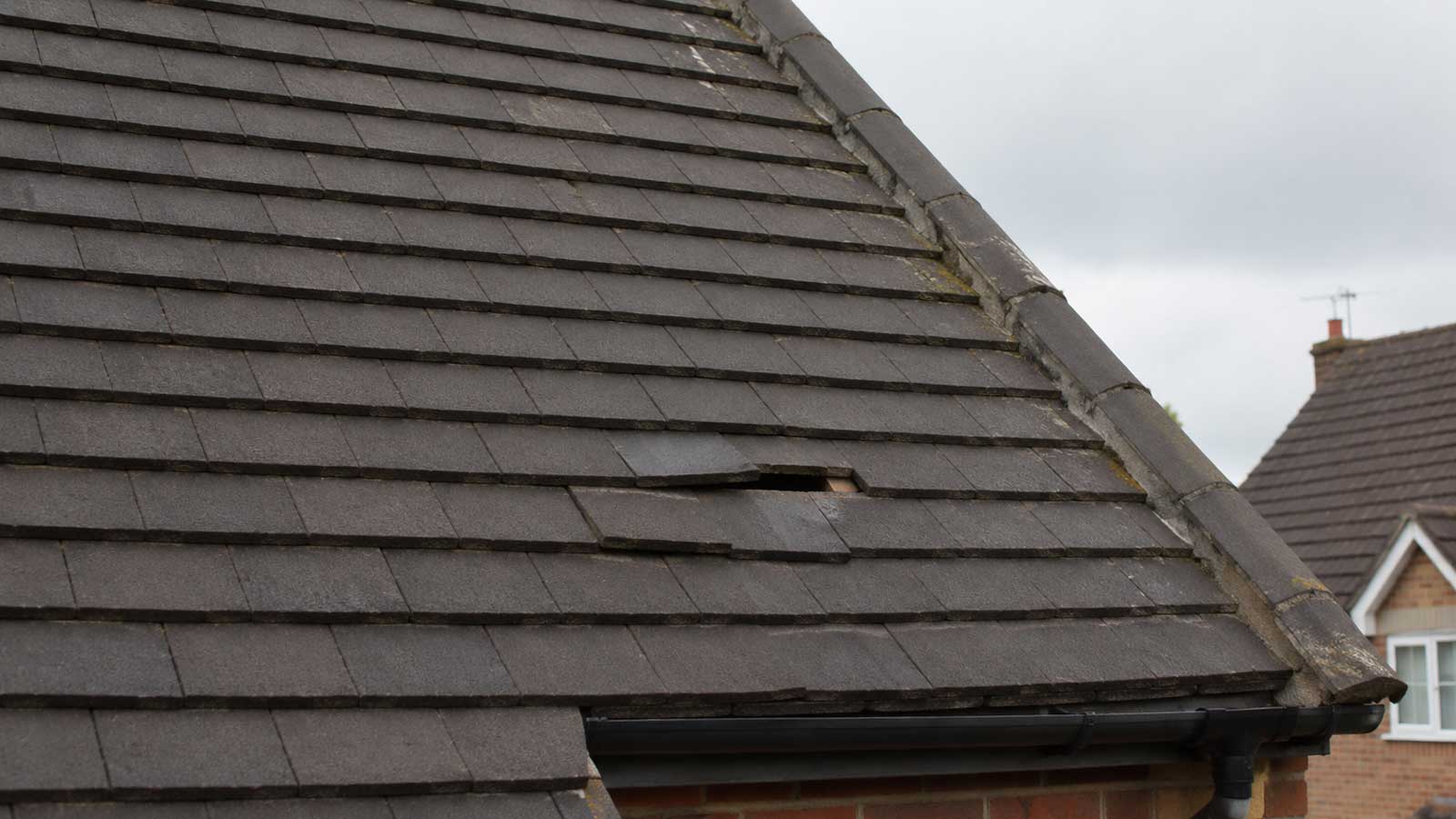 Illustration relating to slate roof repairs on older blackburn homes